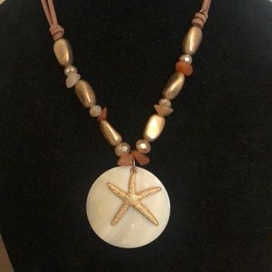 Never used really cute starfish necklace! Perfect for summer!